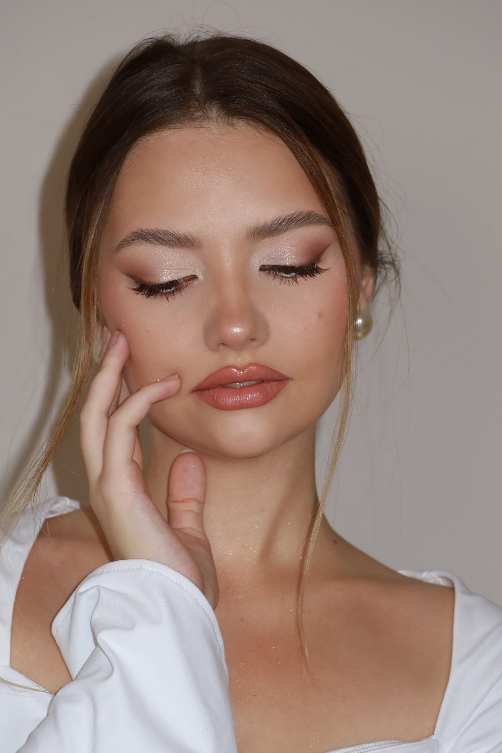 Soft rose glam makeup with luminous skin
